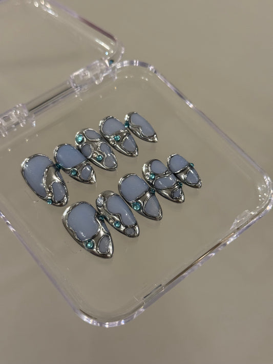 N265 Powder Blue Abstract Nails