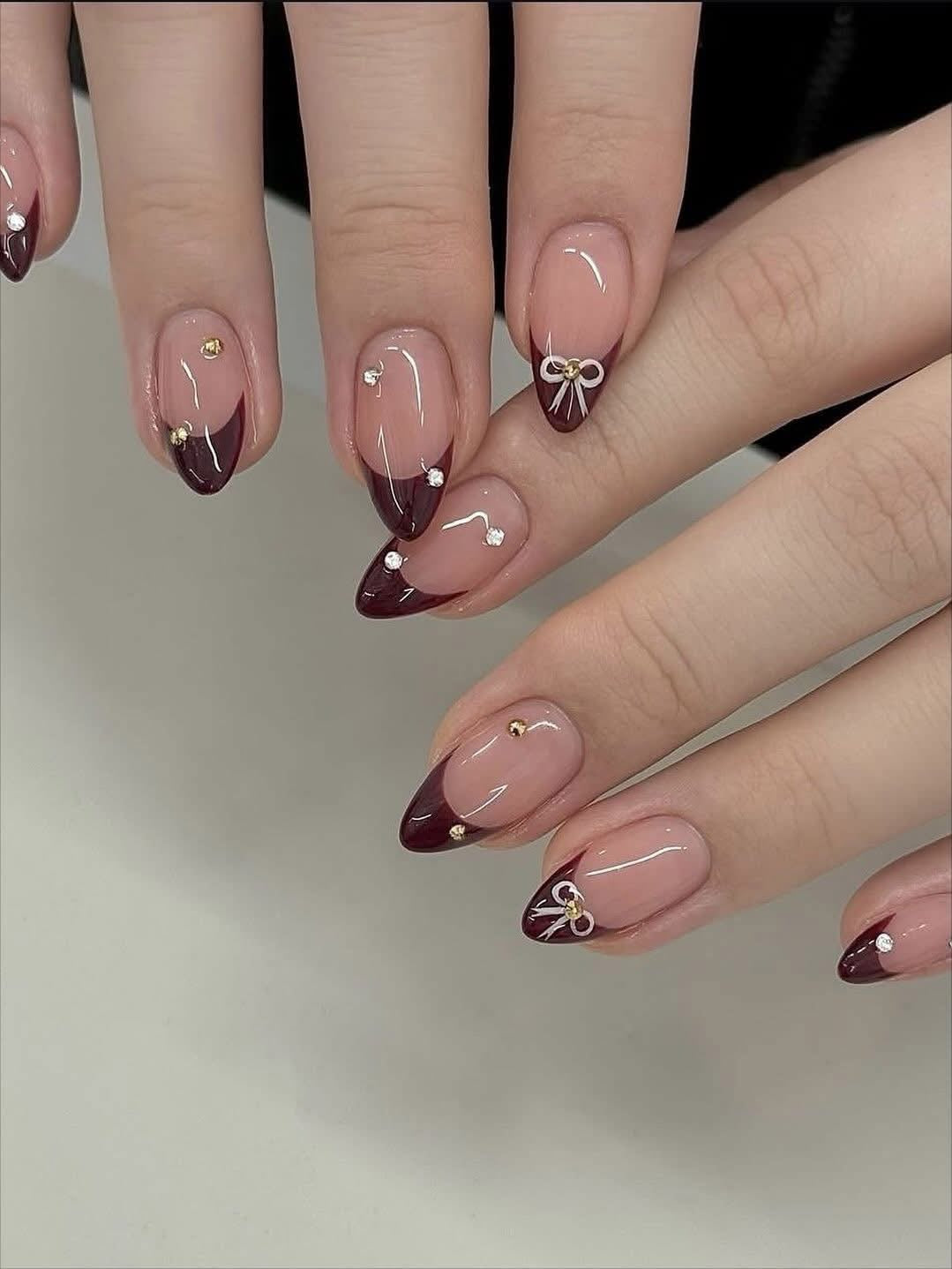 N168 Maroon French Nails