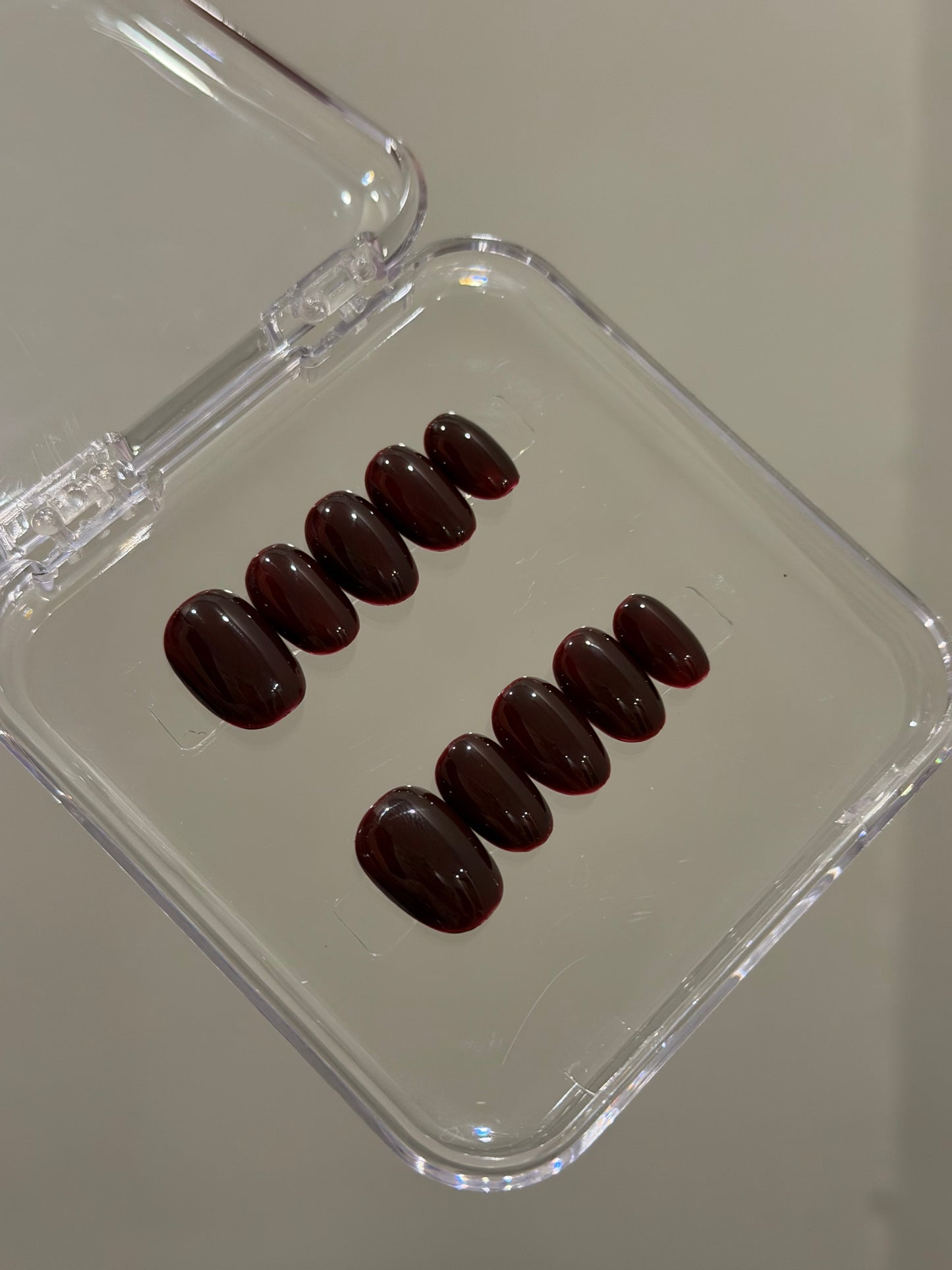 N403 Maroon Short Oval Nails
