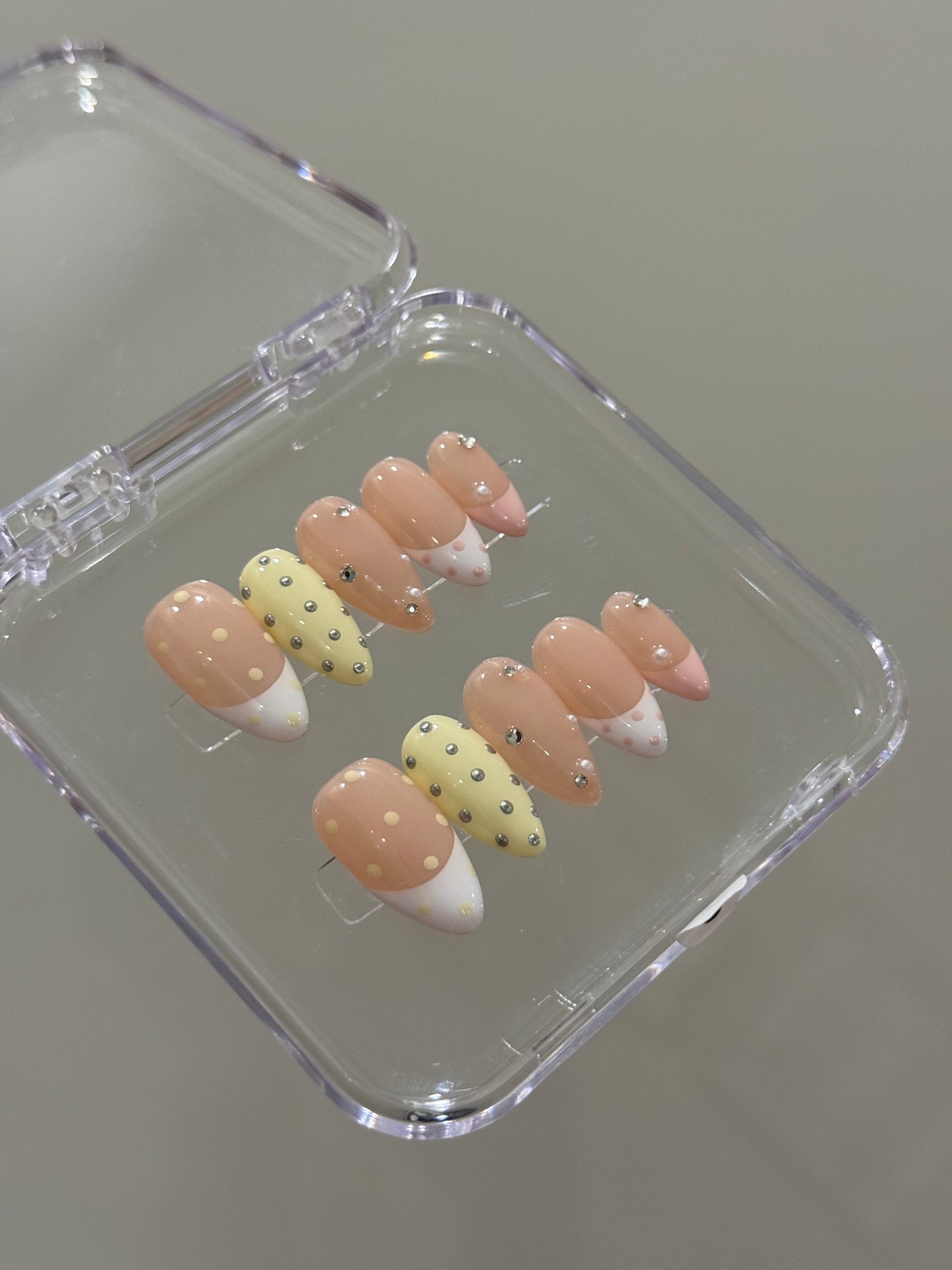 N297 Yellow Studded Nails