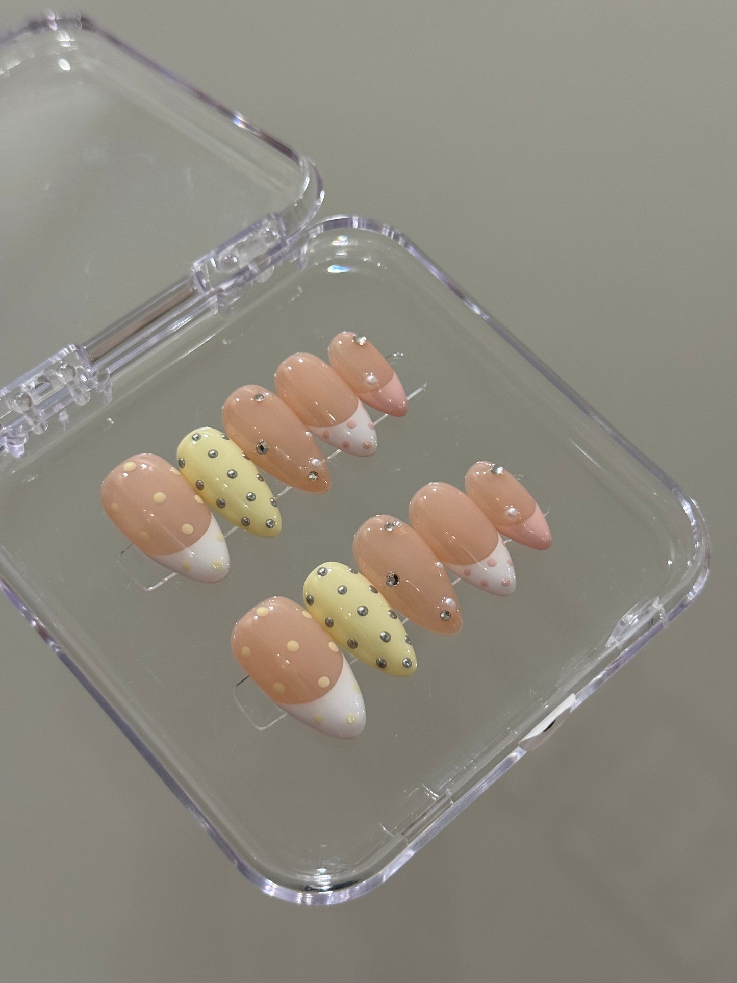 N297 Yellow Studded Nails