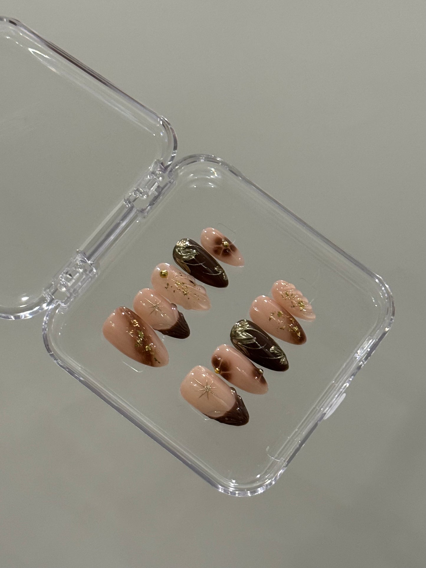 N198 Brown Foiled Nails