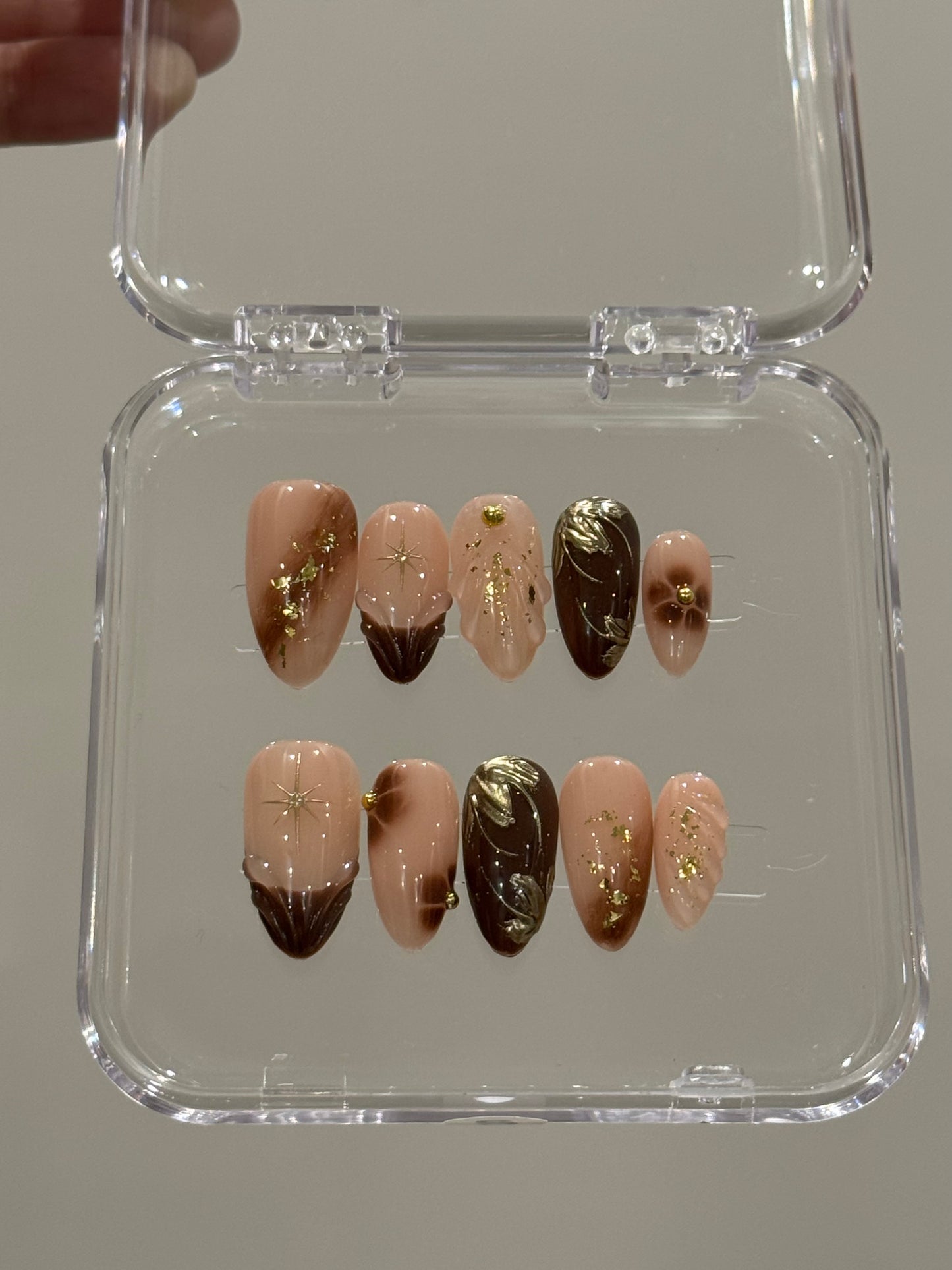 N198 Brown Foiled Nails