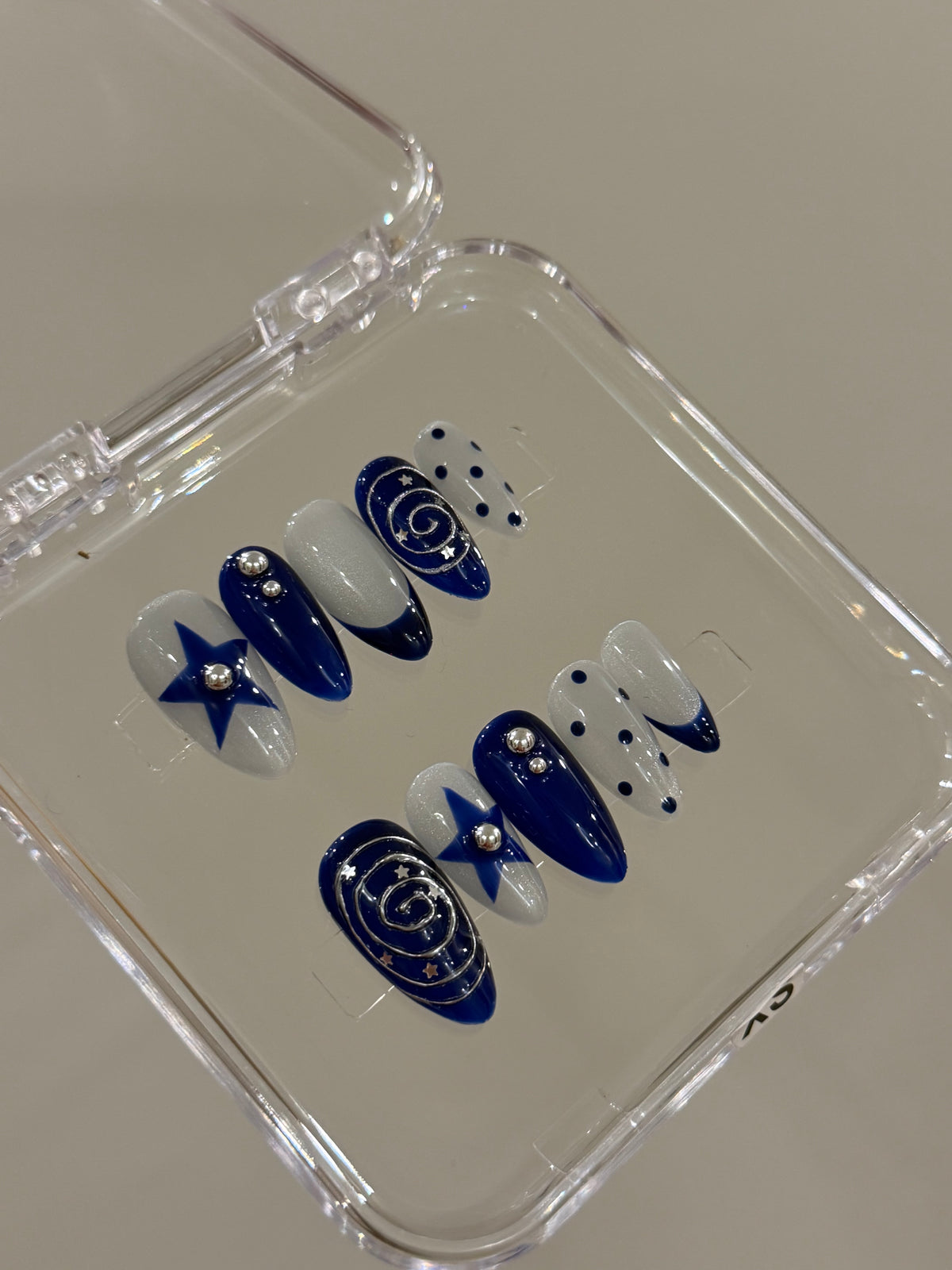 N368 Blue Cateye Star Nails