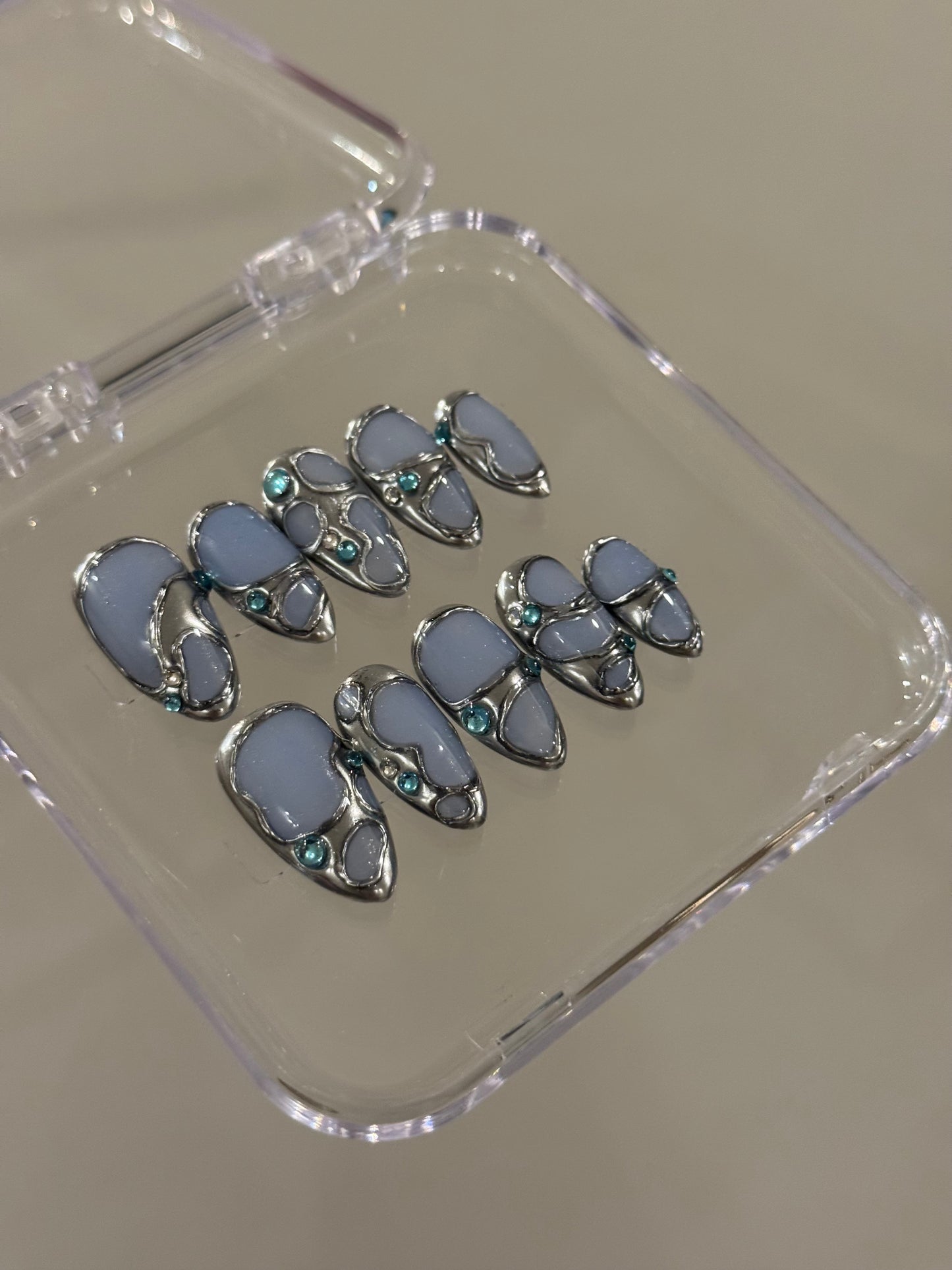 N265 Powder Blue Abstract Nails