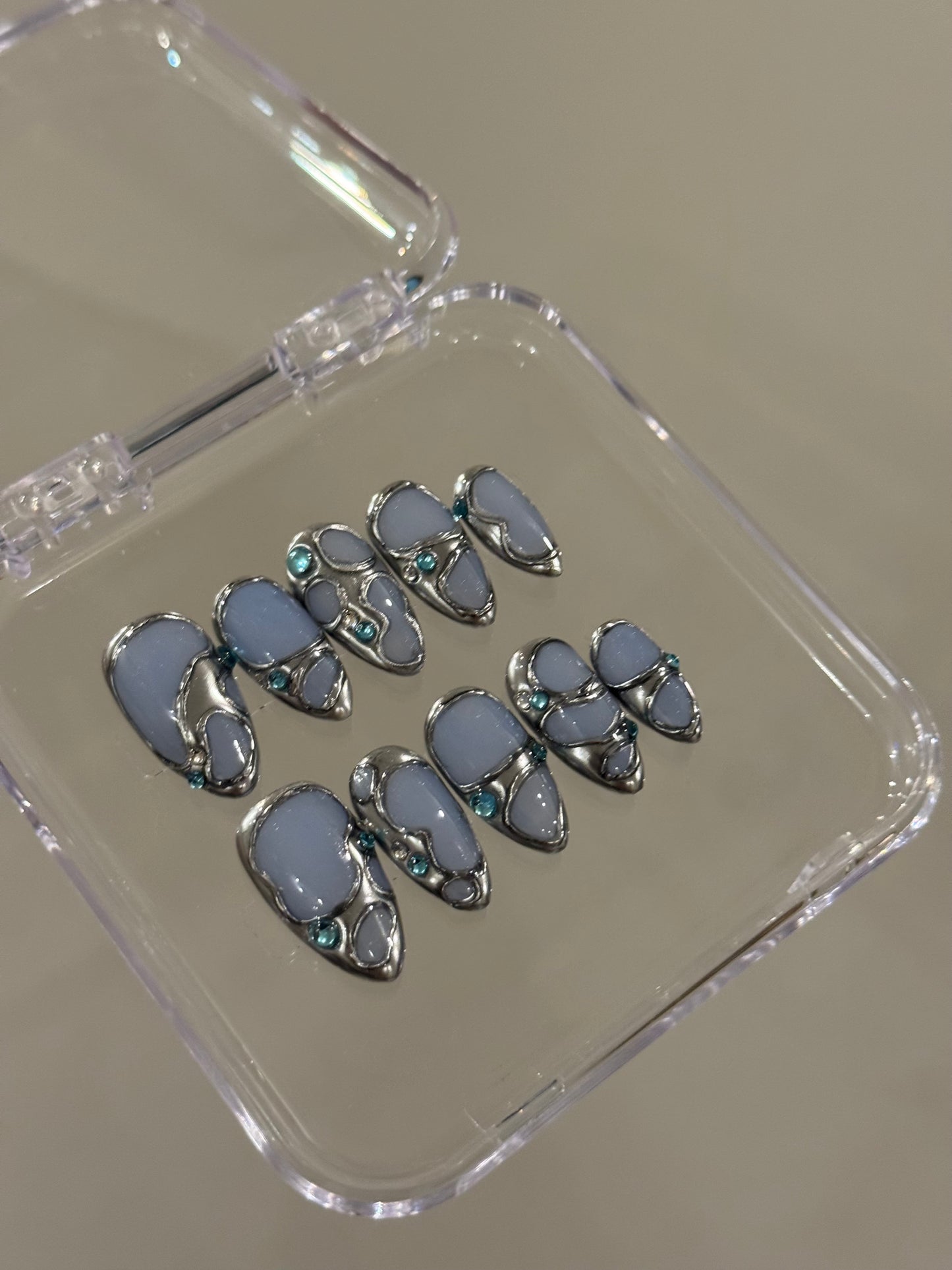 N265 Powder Blue Abstract Nails