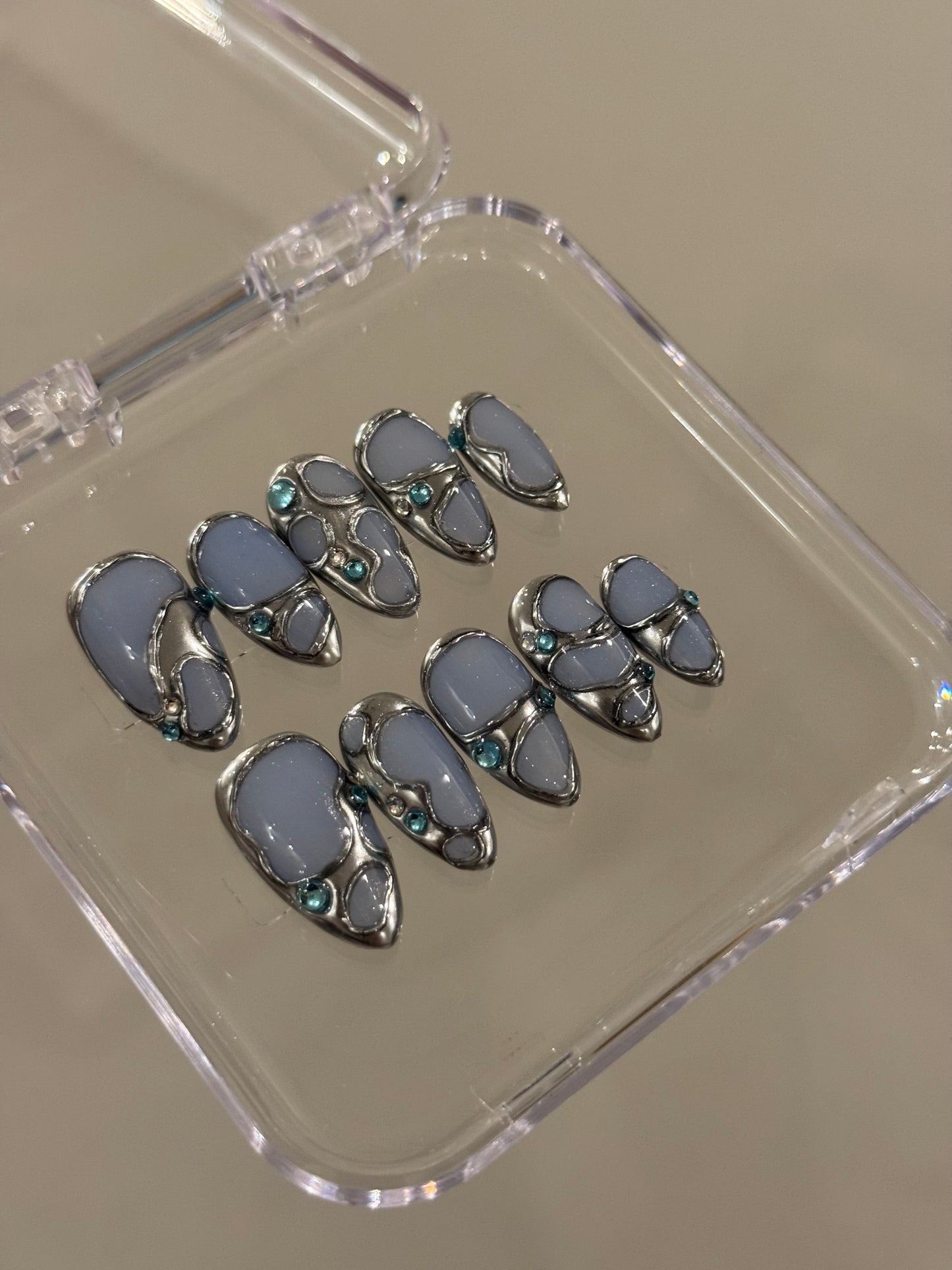 N265 Powder Blue Abstract Nails