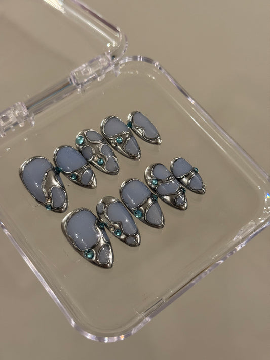 N265 Powder Blue Abstract Nails