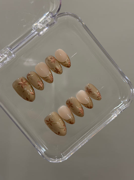 N384 Gold Zinnia Nails