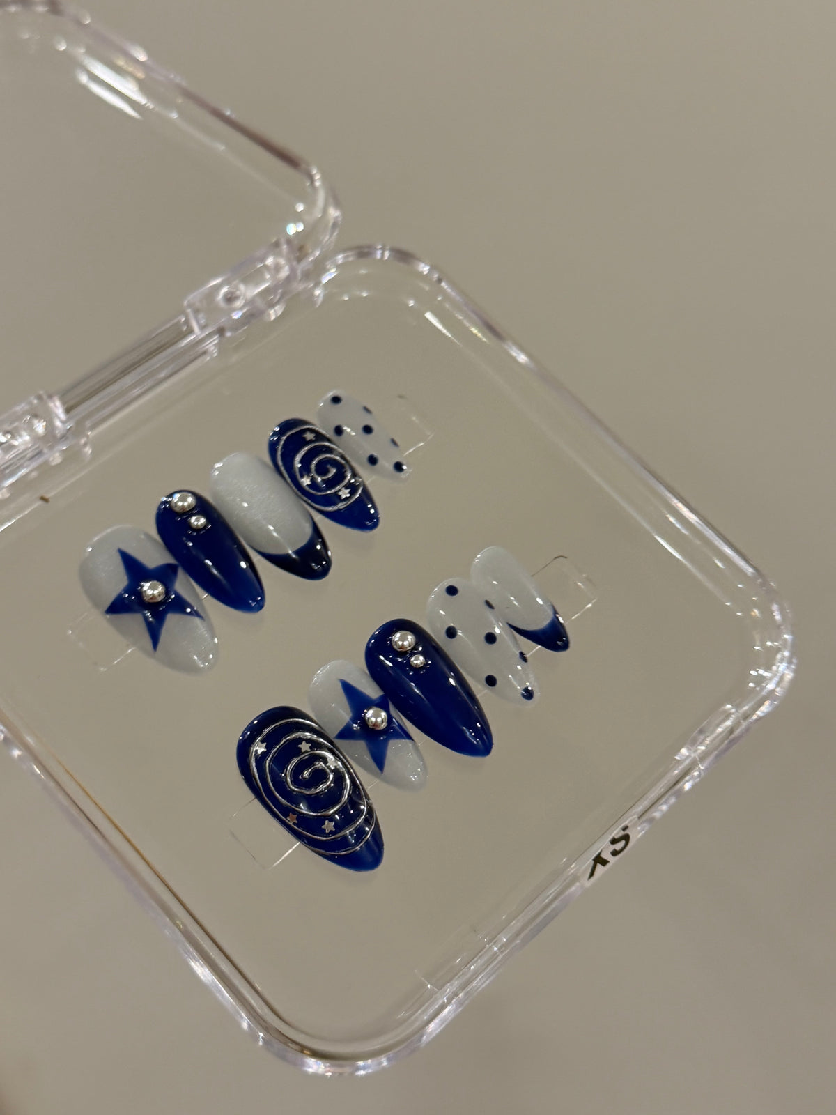 N368 Blue Cateye Star Nails